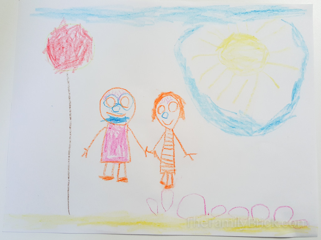 Max with seashells and pompom tree at the beach with a friend.